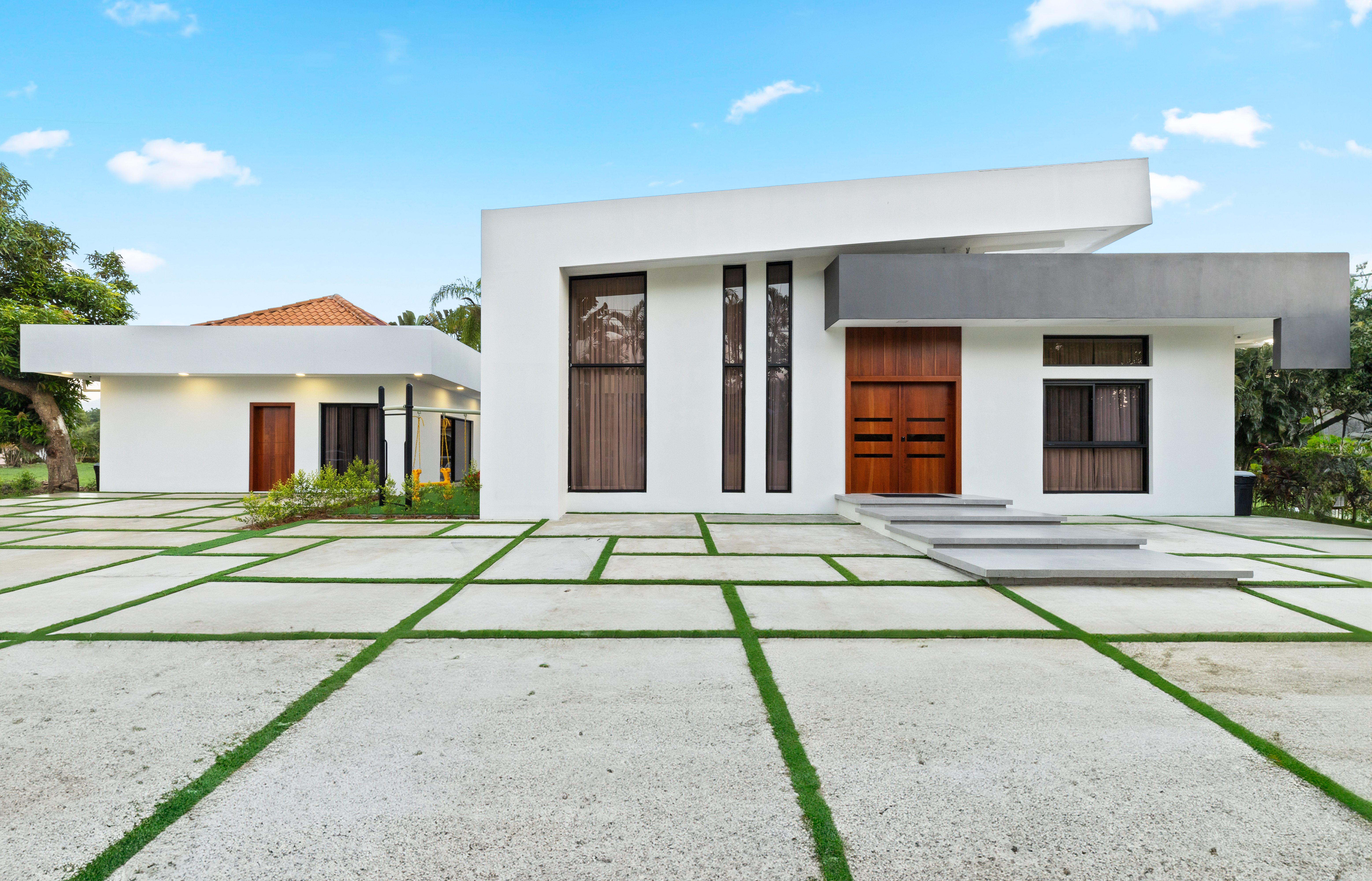 Contemporary white house with front garden